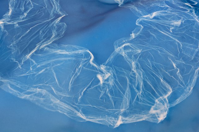 Cyanotypes of plastic on translucent paper